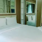 Homey And Warm Studio Room At Tifolia Apartment By Travelio