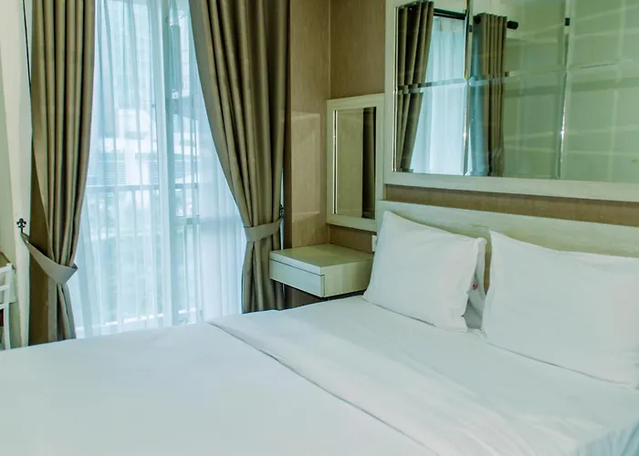 Homey And Warm Studio Room At Tifolia Apartment By Travelio