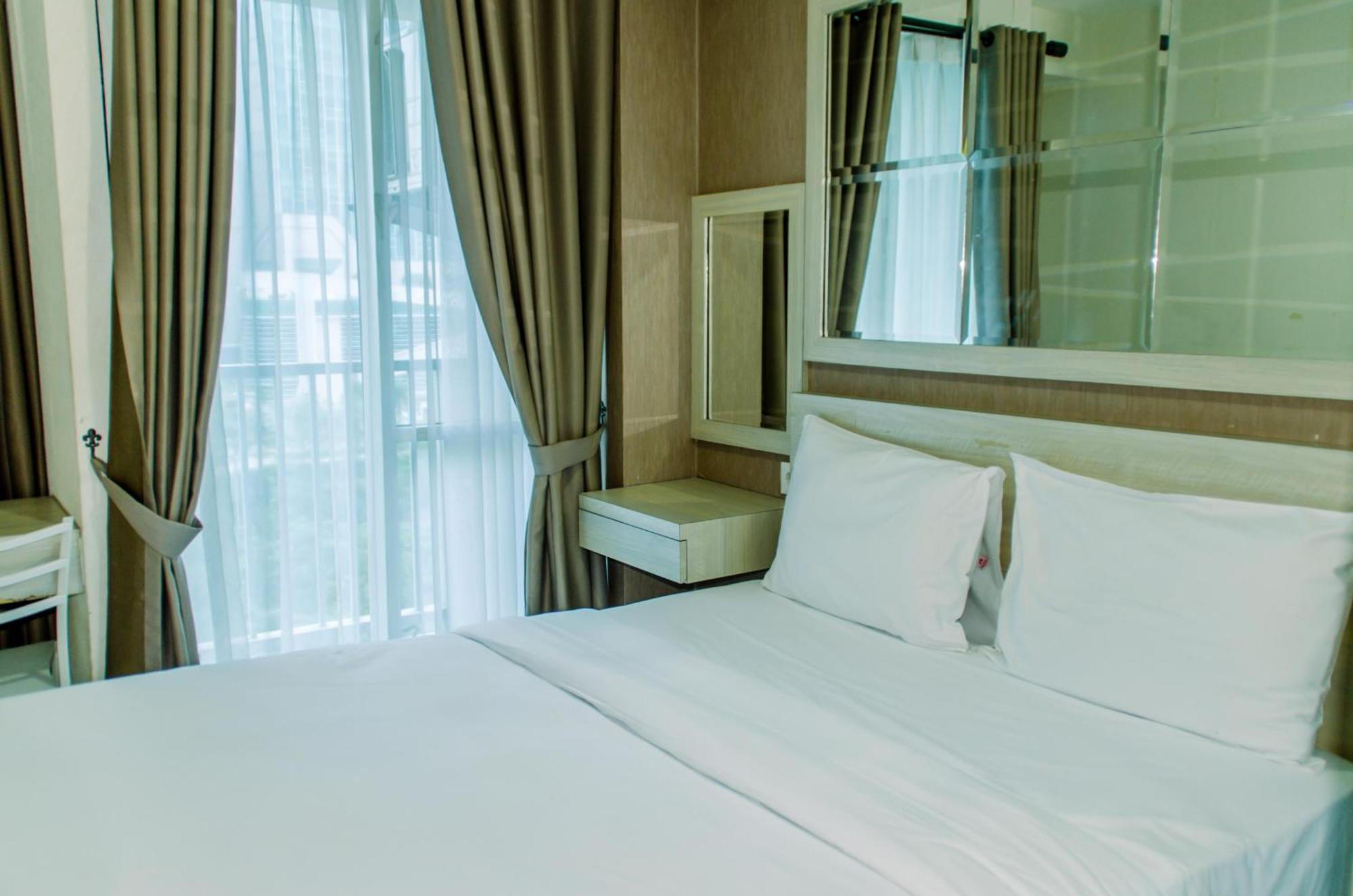 Homey And Warm At Tifolia By Travelio Apartment